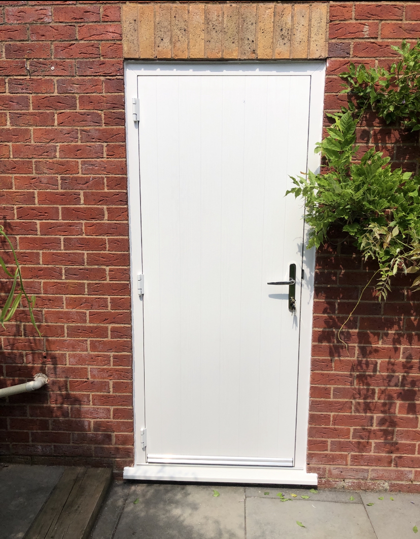 Solid white composite back door no glass
