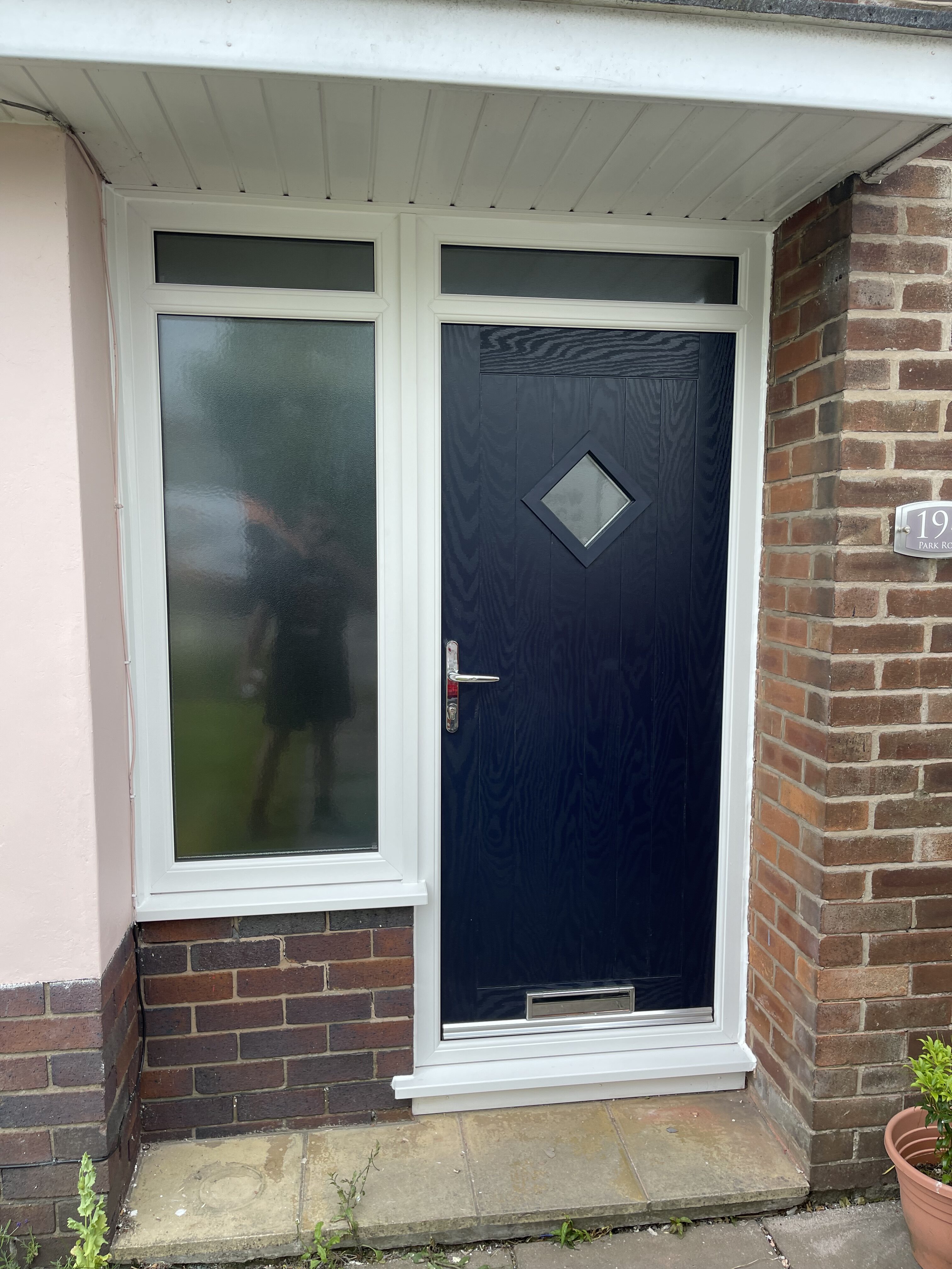 Dark blue door slab with white frame diamond traditional front composite door