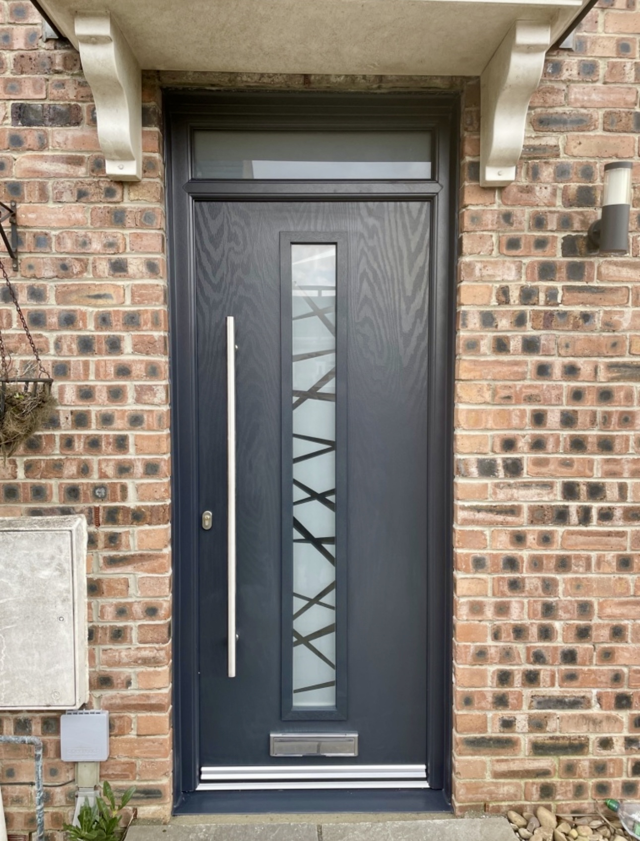 Anthracite grey modern front composite door with long bar handle