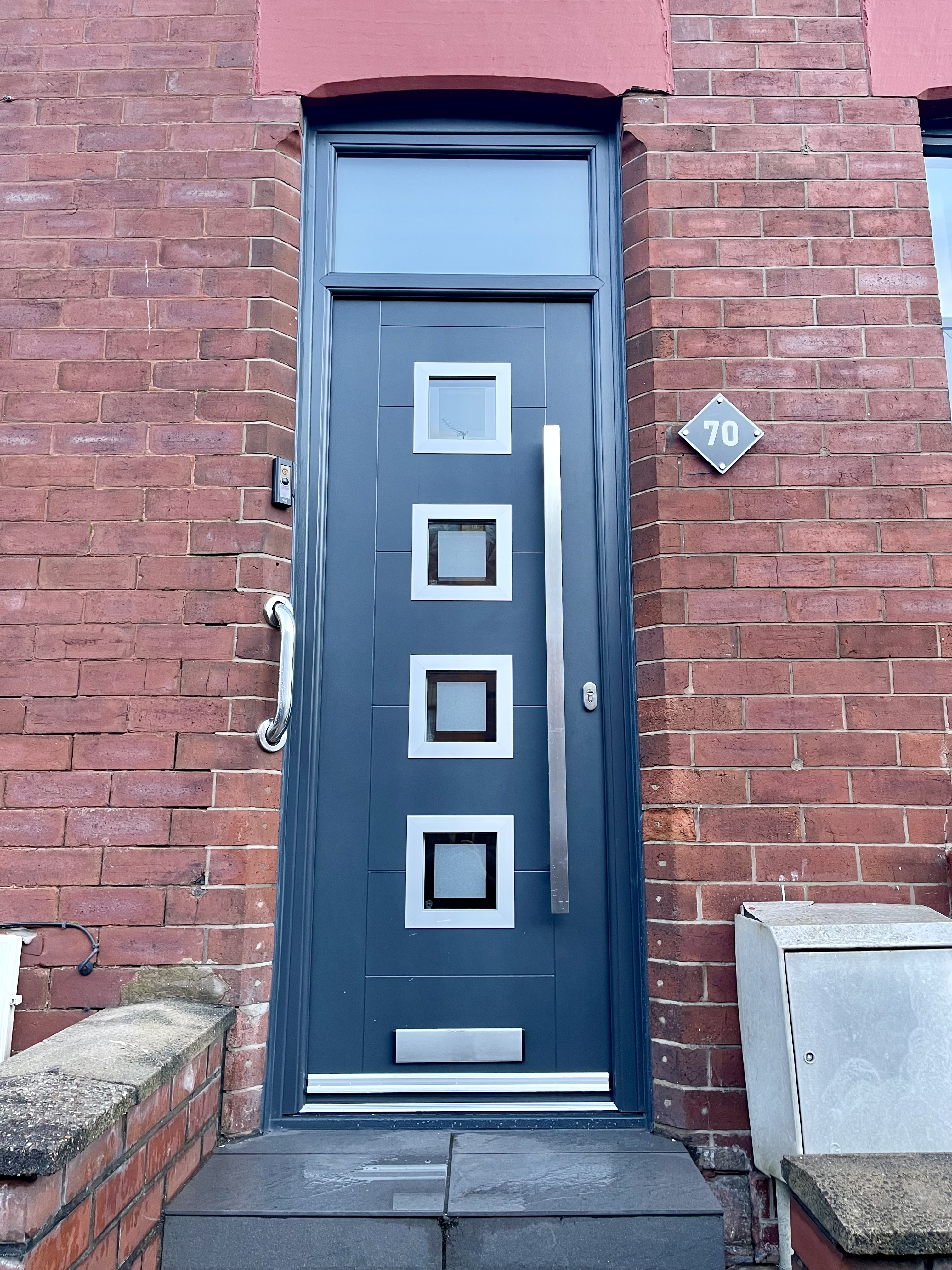 Alu Modern composite front door in anthracite grey with square long bar handle