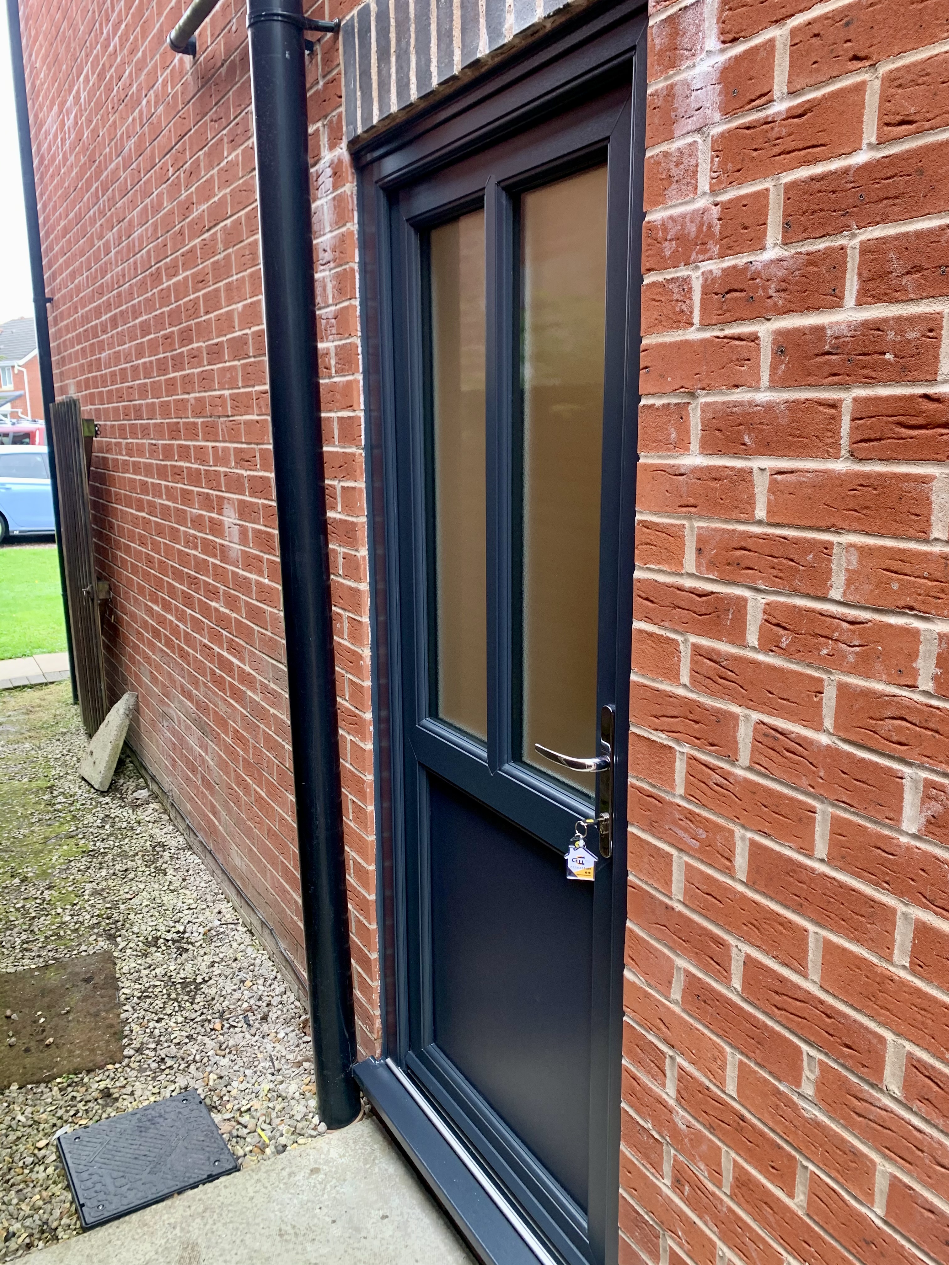 Anthracite grey PVC Mid-rail back door with stippolyte privacy glass