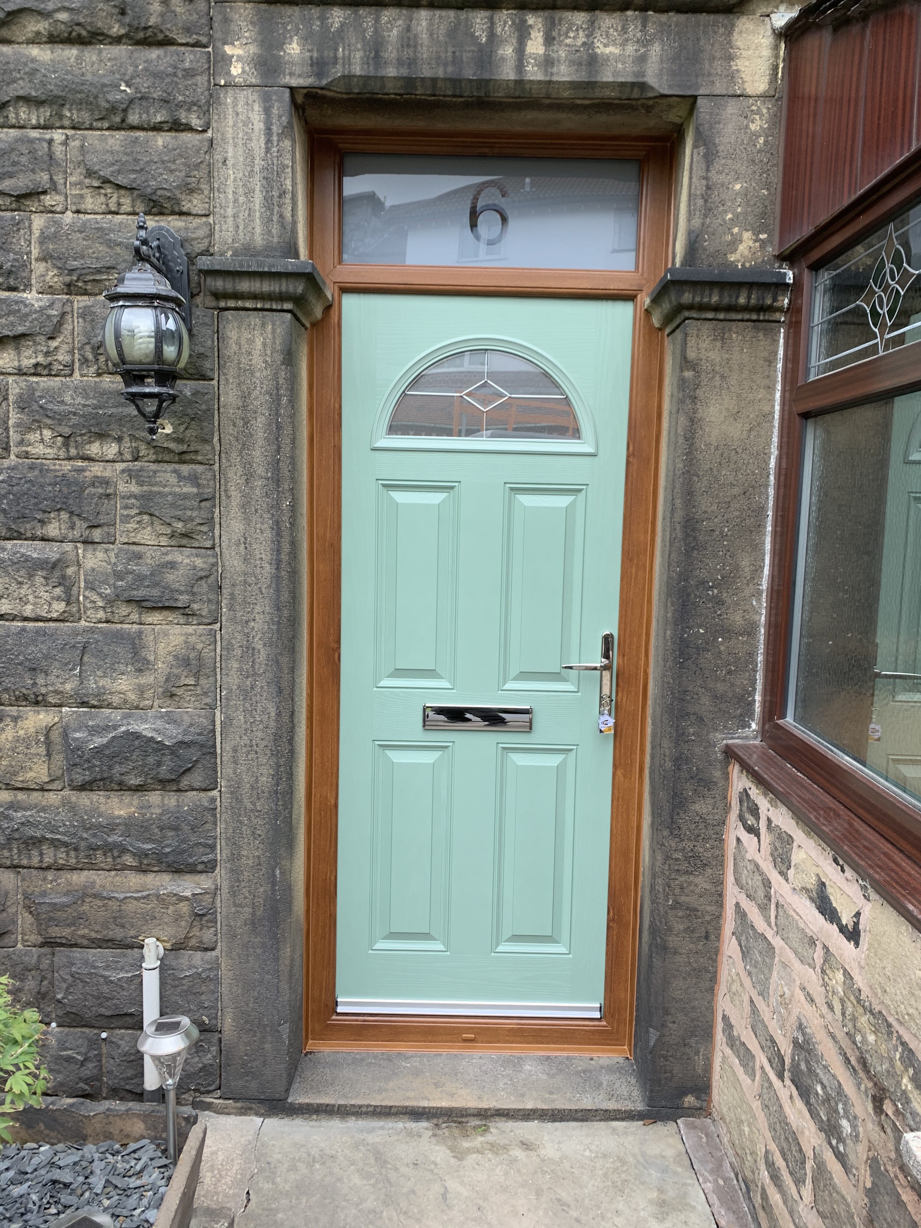 Chartwell green door slab with royal oak door frame traditional composite front door