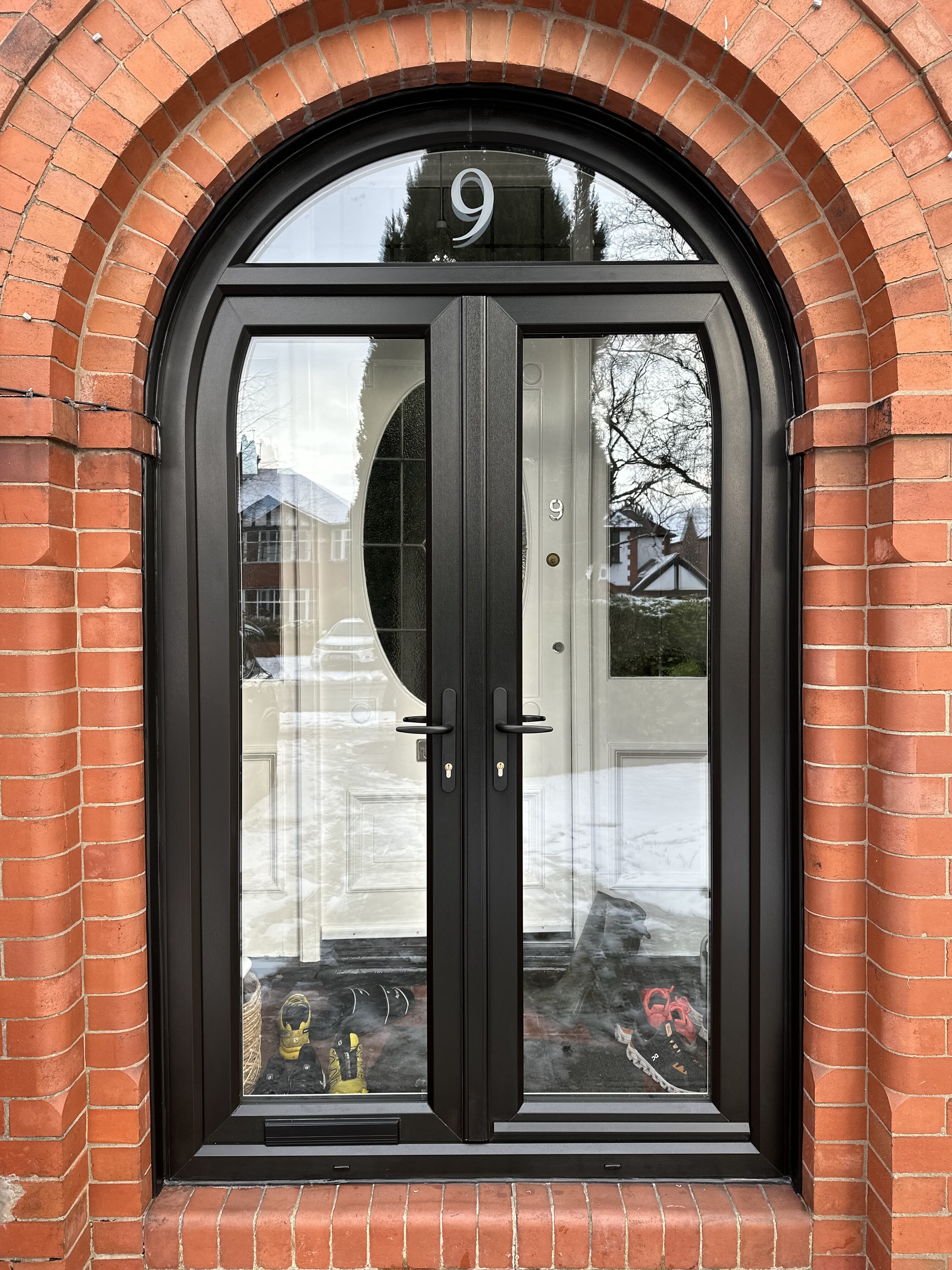 Arched PVC Black French doors with clear glass and satin number 9